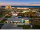 Aerial view of a coastal property with pool near the beach at 833 E 26Th Ave, New Smyrna Beach, FL 32169