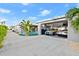 View of a house's garage and driveway at 833 E 26Th Ave, New Smyrna Beach, FL 32169