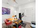 Home office with a desk, exercise bike, and storage closet at 833 E 26Th Ave, New Smyrna Beach, FL 32169