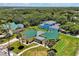 House with green roof, ocean view, and large yard at 886 Matthews Ave, New Smyrna Beach, FL 32169