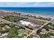 Aerial view highlighting home's location near beach and shopping at 886 Matthews Ave, New Smyrna Beach, FL 32169