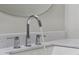 Bathroom with modern faucet and white sink at 886 Matthews Ave, New Smyrna Beach, FL 32169