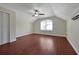 Bedroom with hardwood floors and ceiling fan at 886 Matthews Ave, New Smyrna Beach, FL 32169