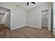 Spacious bedroom with tile flooring and ample closet space at 886 Matthews Ave, New Smyrna Beach, FL 32169