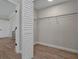 Walk-in closet with ample shelving and hanging space at 886 Matthews Ave, New Smyrna Beach, FL 32169