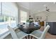 Casual dining area with a round table and chairs near kitchen at 886 Matthews Ave, New Smyrna Beach, FL 32169