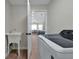 Laundry room with utility sink and view of kitchen at 886 Matthews Ave, New Smyrna Beach, FL 32169