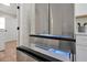 Stainless steel refrigerator with large capacity and bottom freezer at 886 Matthews Ave, New Smyrna Beach, FL 32169