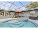 Enjoy this refreshing pool and spa area at 1052 Tompkins Dr, Port Orange, FL 32129