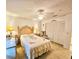 Well-lit bedroom with a queen-size bed and closet at 112 Reserve Cir # 104, Oviedo, FL 32765