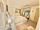 Spacious bedroom with large bed, dresser, and ample floor space at 112 Reserve Cir # 104, Oviedo, FL 32765