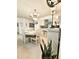 Bright dining room features a round table and chandelier at 112 Reserve Cir # 104, Oviedo, FL 32765
