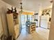 Bright kitchen features an island, white appliances, and ample cabinet space at 112 Reserve Cir # 104, Oviedo, FL 32765