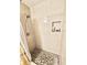Updated shower with tiled walls and a hexagon floor at 112 Reserve Cir # 104, Oviedo, FL 32765