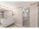 Elegant bathroom featuring double vanity and walk-in shower at 1343 Coconut Palm Cir, Port Orange, FL 32128