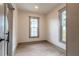 Simple bedroom with hardwood floors and neutral walls at 208 Douglas St, New Smyrna Beach, FL 32168