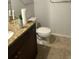 Bathroom with granite countertop and neutral tile floors at 209 Villa Di Este Ter # 113, Lake Mary, FL 32746