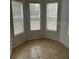 Bright breakfast nook with three windows and tile floor at 209 Villa Di Este Ter # 113, Lake Mary, FL 32746