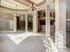 Bright dining room with tiled floors and large mirrors at 216 Ocean Dr, New Smyrna Beach, FL 32169