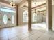 Bright and spacious entryway with tile floors and high ceilings at 216 Ocean Dr, New Smyrna Beach, FL 32169