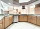 Kitchen with granite countertops and stainless steel appliances at 216 Ocean Dr, New Smyrna Beach, FL 32169