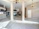 Open living room with high ceilings and tile floors at 216 Ocean Dr, New Smyrna Beach, FL 32169