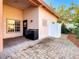 Outdoor kitchen and patio area with brick pavers at 216 Ocean Dr, New Smyrna Beach, FL 32169
