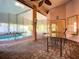 Relaxing pool area with covered patio and brick pavers at 216 Ocean Dr, New Smyrna Beach, FL 32169