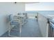 Oceanfront balcony with seating area at 2987 S Atlantic Ave # 903, Daytona Beach, FL 32118