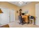 Spacious home office with wood desk and comfortable seating at 311 Florida Ave, New Smyrna Beach, FL 32169