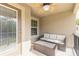 Balcony with outdoor seating, overlooking natural scenery at 3414 Medici Blvd, New Smyrna Beach, FL 32168