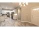 Bright kitchen with white cabinetry, stainless steel appliances, and tile flooring at 3414 Medici Blvd, New Smyrna Beach, FL 32168