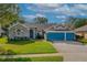 Charming single-Gathering home with a two-car garage and lush green lawn at 3769 Fiano Dr, Port Orange, FL 32129
