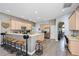 Modern kitchen with stainless steel appliances, breakfast bar, and ample counter space at 3769 Fiano Dr, Port Orange, FL 32129