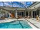 Relaxing screened-in pool and patio area with ample space for lounging at 3769 Fiano Dr, Port Orange, FL 32129