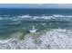 Stunning aerial view of ocean waves at 4200 Sun Village Ct # 33D, New Smyrna Beach, FL 32169