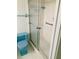 Bathroom with shower stall, toilet and grab bars at 4255 S Atlantic Ave, Port Orange, FL 32127