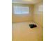 Empty carpeted bedroom with two windows at 4255 S Atlantic Ave, Port Orange, FL 32127