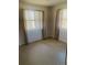 Bright bedroom with neutral decor and carpet at 4255 S Atlantic Ave, Port Orange, FL 32127