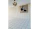 Dining room with tiled floors and a unique wall hanging at 4255 S Atlantic Ave, Port Orange, FL 32127