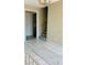 Home entryway with tiled floor and staircase at 4255 S Atlantic Ave, Port Orange, FL 32127