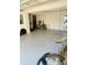 Garage with bicycle, tools, and vacuum cleaner at 4255 S Atlantic Ave, Port Orange, FL 32127