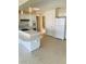 White kitchen with ample counter space and built-in appliances at 4255 S Atlantic Ave, Port Orange, FL 32127