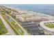Aerial view showcasing beachfront property and amenities at 4811 Saxon Dr # C102, New Smyrna Beach, FL 32169