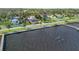 Aerial view of waterfront property with private dock at 4946 Halifax Dr, Port Orange, FL 32127