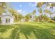 Large backyard with a studio and a spacious lawn at 4946 Halifax Dr, Port Orange, FL 32127