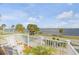 Relaxing balcony with rocking chairs and scenic water views at 4946 Halifax Dr, Port Orange, FL 32127