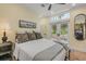 Cozy bedroom with queen bed and sliding barn doors at 4946 Halifax Dr, Port Orange, FL 32127