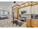 Modern kitchen with granite island, stainless steel appliances, and custom cabinets at 4946 Halifax Dr, Port Orange, FL 32127
