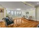 Bright living area with hardwood floors and water views at 4946 Halifax Dr, Port Orange, FL 32127